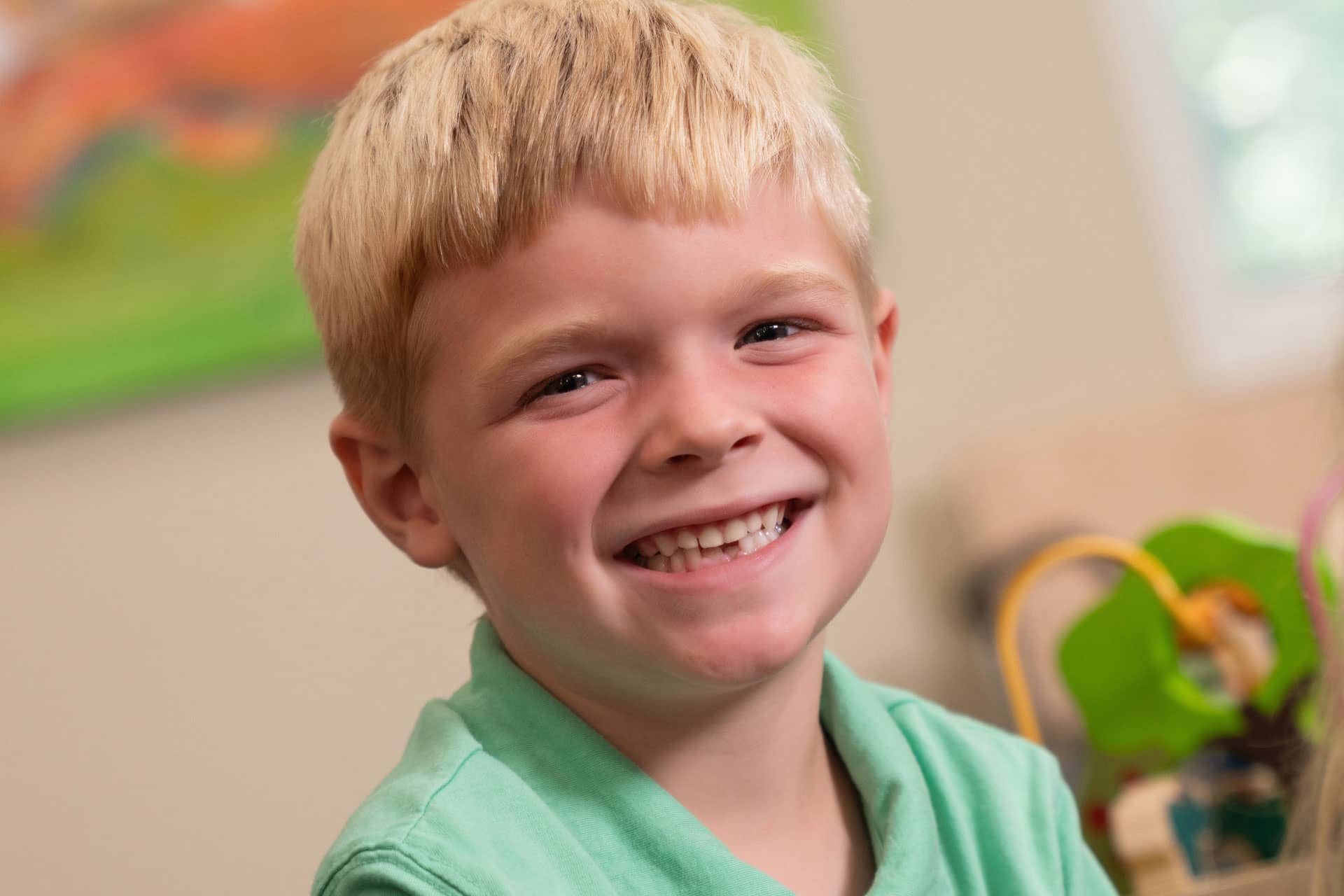 smiling male pediatric patient