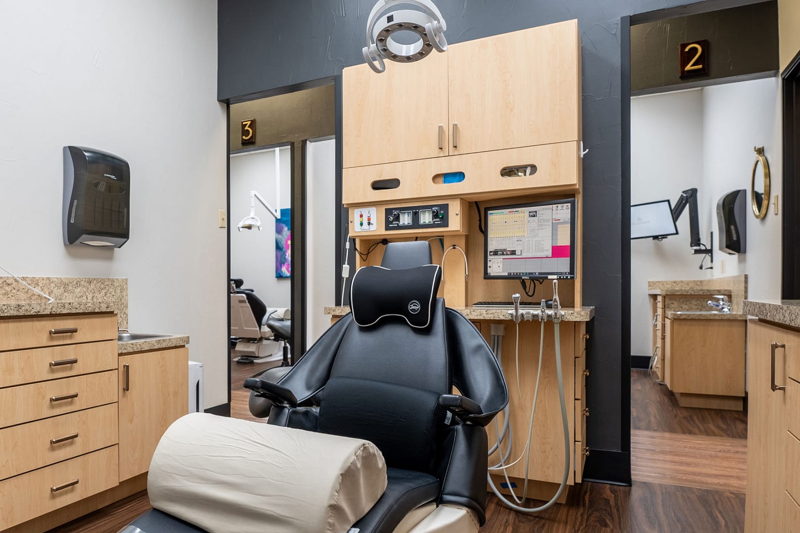 exam room with dental chair and equipment