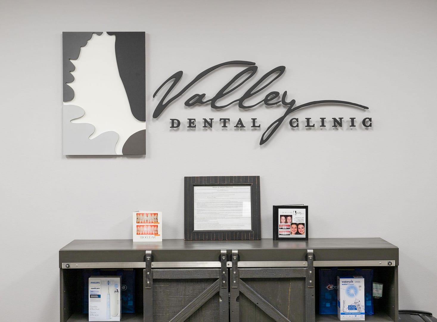 valley dental clinic logo on wall