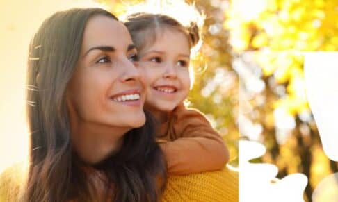 mom and daughter smiling