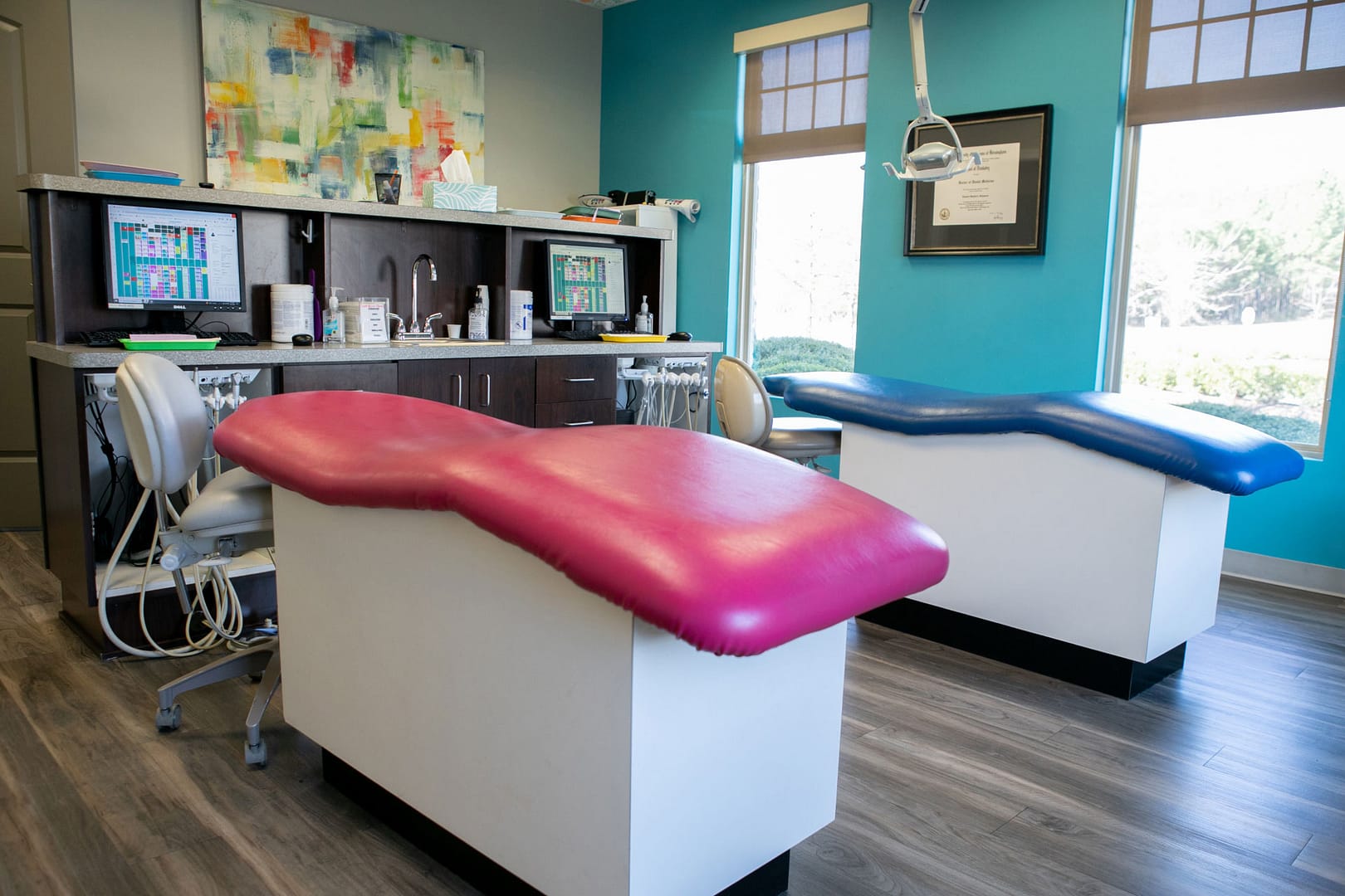 colorful exam room with dental equipment