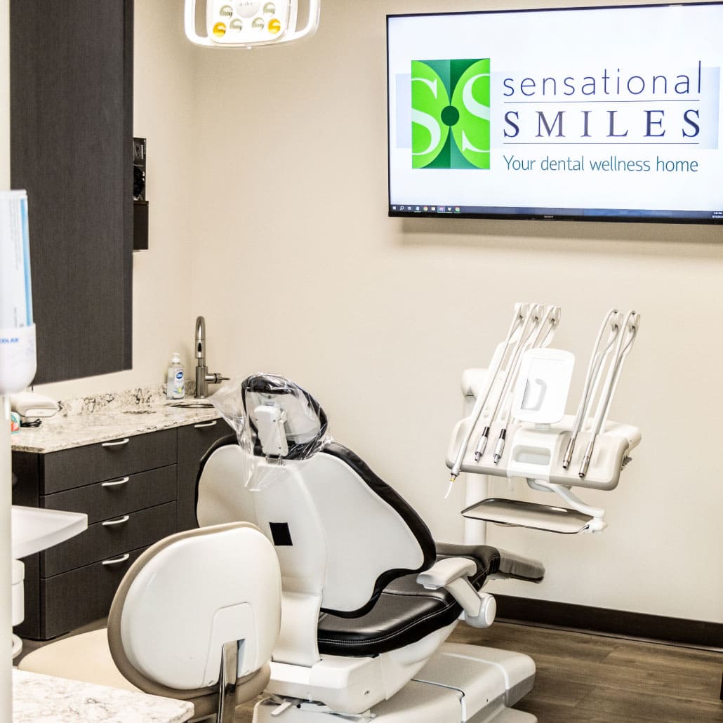 exam room with dental chair and equipment