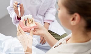 Restore your smile with dental implants.
