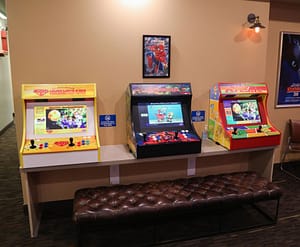 row of mini arcade games sitting on table