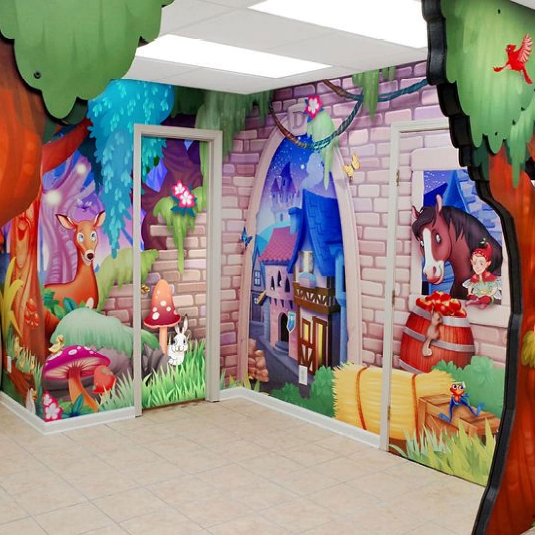 children's play area with fairy tale wall mural