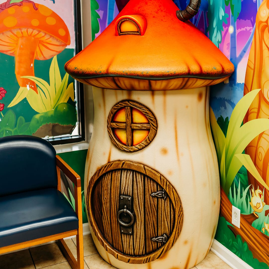 children's play area with mushroom house