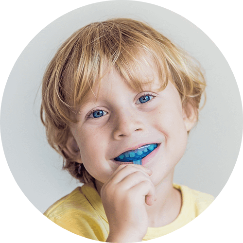 Kid with mouthguard in