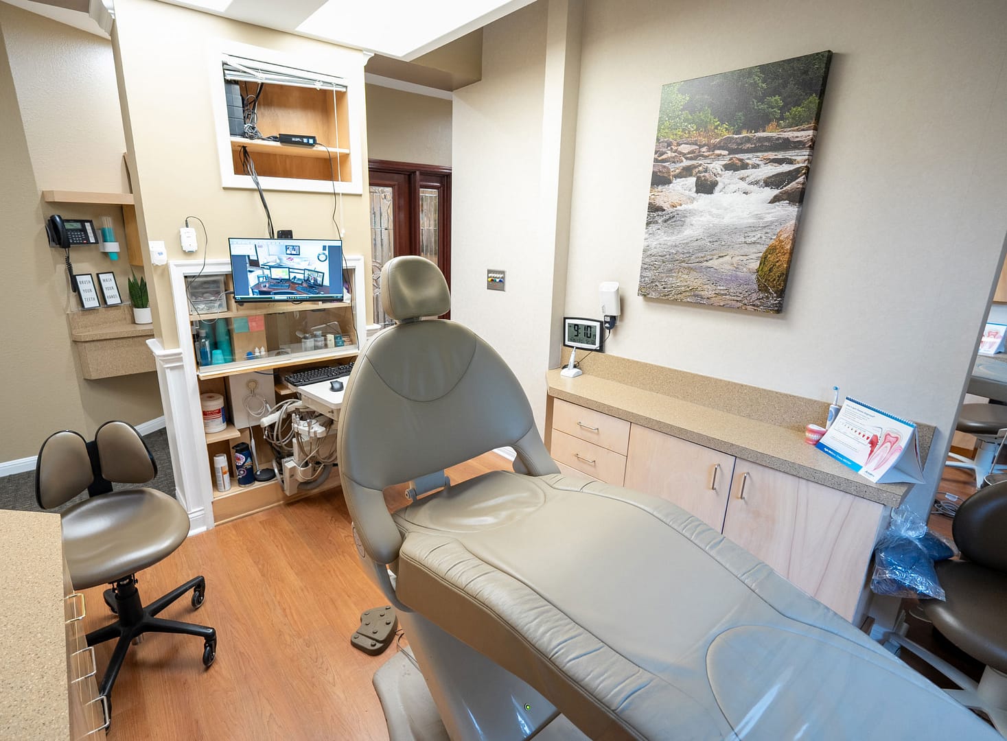 exam room with dental chair and equipment
