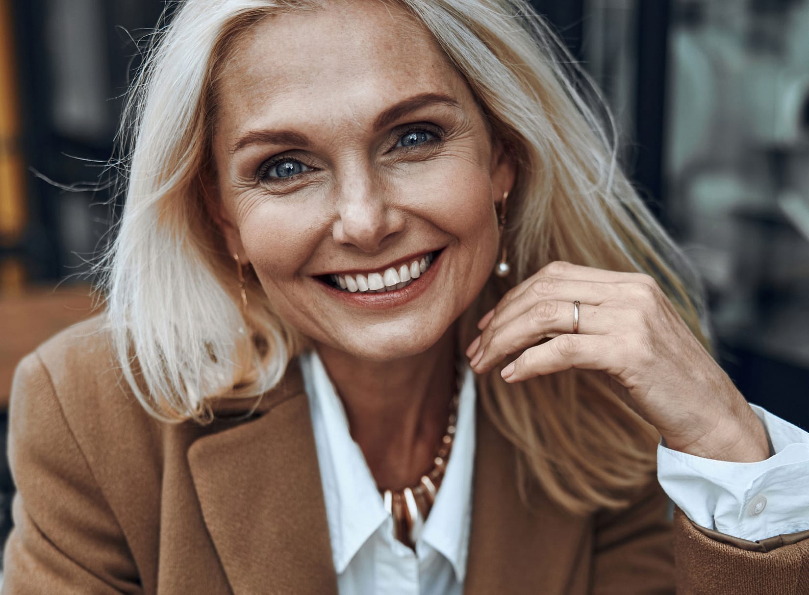 older woman smiling at camera