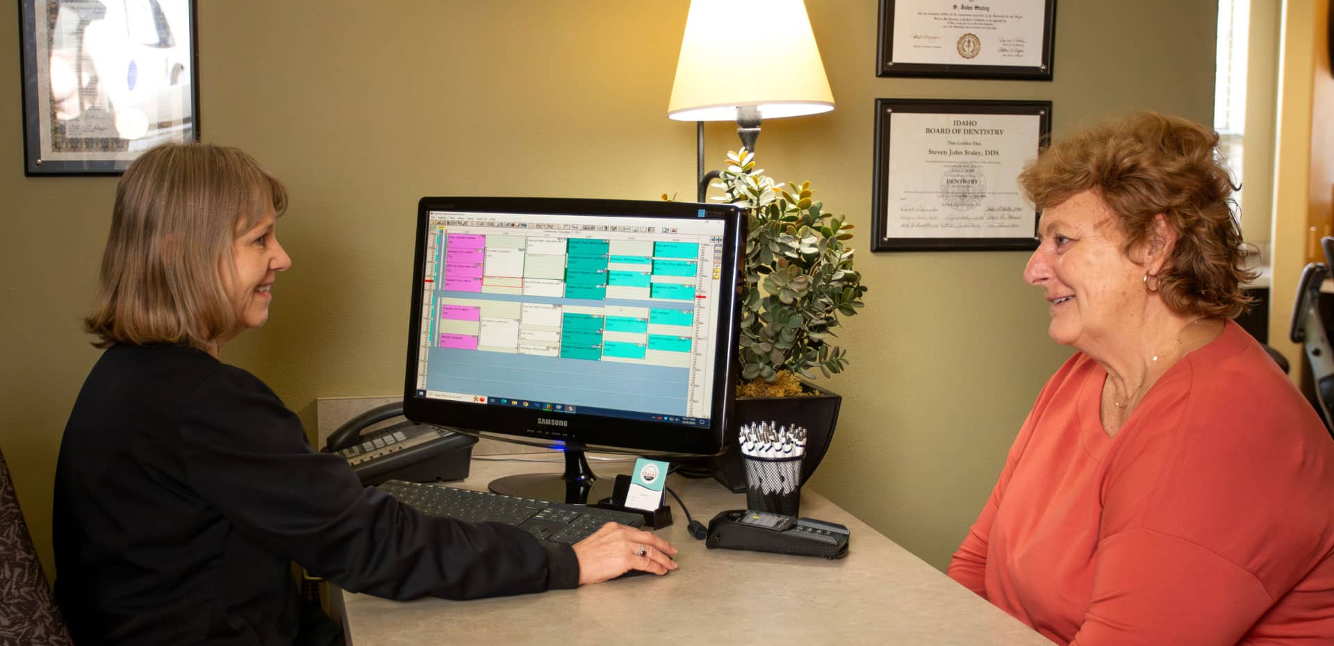 patient and team member going over finances