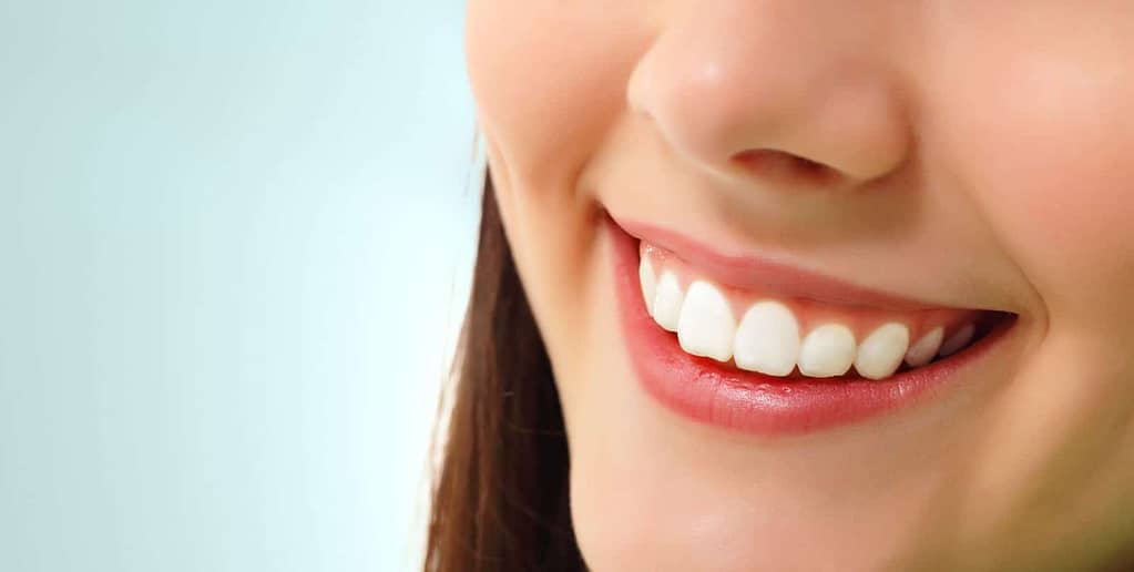 Dental Crowns vs Veneers: Costs and Procedures