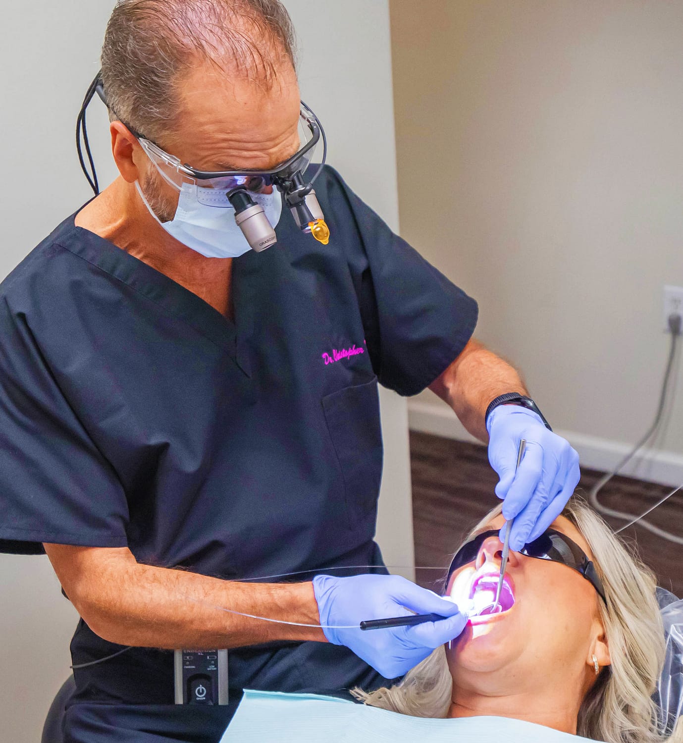 Dr. King working on patient